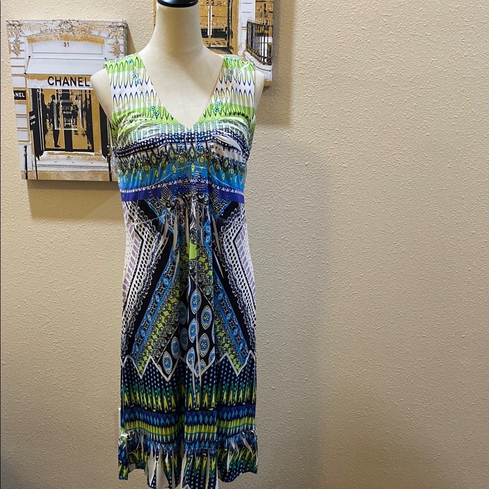 Vibrant Sleeveless Dress with Rhinestones in a Geometric Pattern.